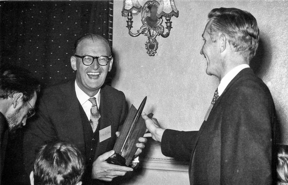 Arthur C. Clarke receives Hugo Award from chairman Dave Kyle at the 1956 Worldcon, NyCon II.