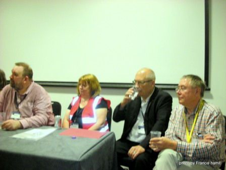 Loncon 3 co-chairs Steve Cooper and Alice Lawson at left. Guests of Honor John Clute and Malcolm Edwards at right, during press briefing.