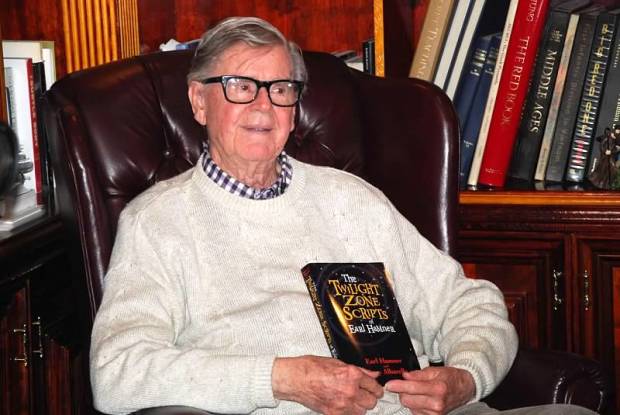 Earl Hamner with his book of Twilight Zone scripts.