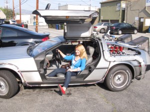 Kristina Etchison in Back To The Future replica DeLorean auto.