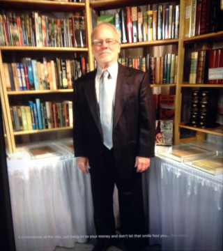 Van de Carr in front of his booth at a rare book show in New York. Photo: Lawrence Van De Carr