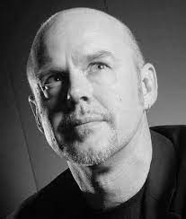 AUTHOR PHOTO: A black and white author photo of award winning fantasy writer Tad Williams, who happens to be bald.