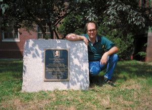 Larry Latham at the grave of H.P. Lovecraft.