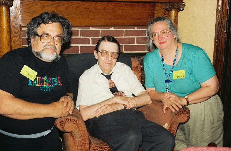 Bruce Pelz, Harry Warner, Jr. and Peggy Rae Pavlat (Sapienza) at FanHistoriCon in 1994. Photo by Rich Lynch.